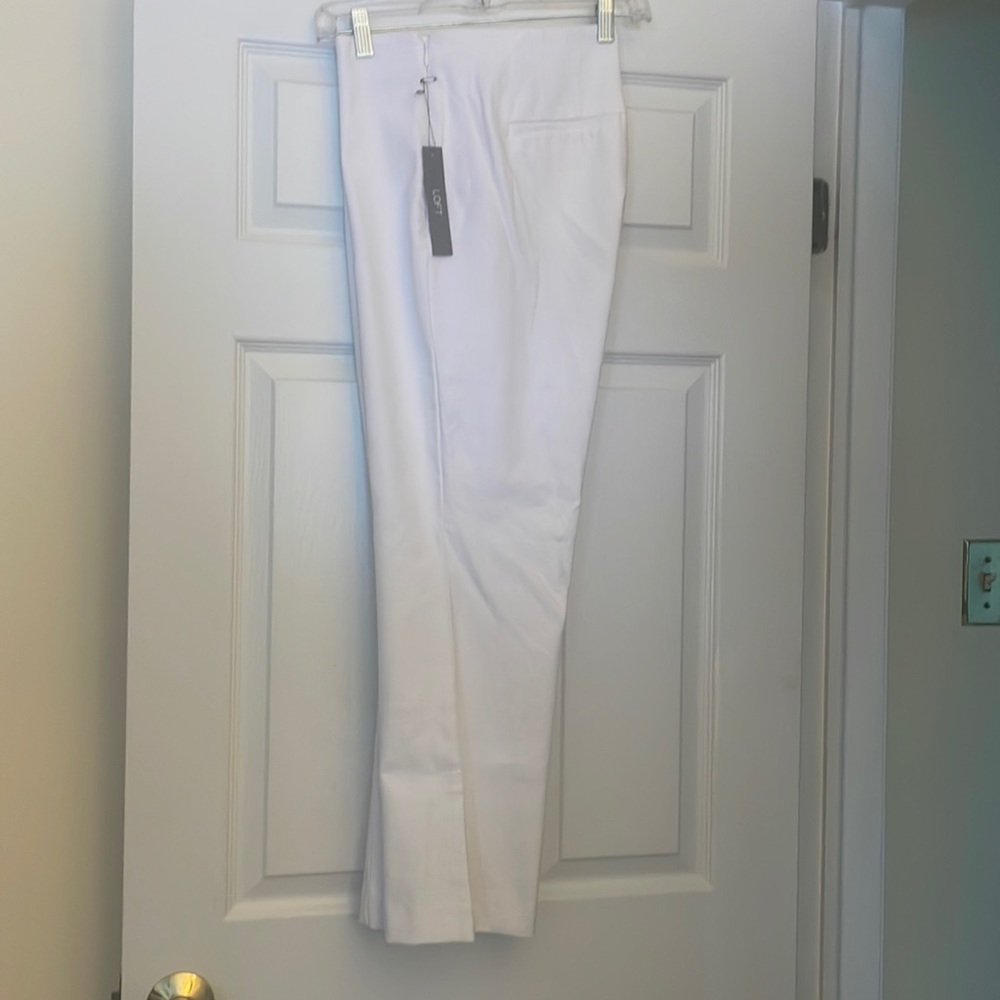 Size 12 curvy white crop pants. Brand new with tags.